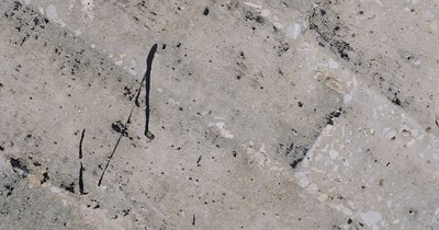 Beton mischen mit Sand und Zement